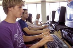 Some traditional college students use campus computer labs for online classes.